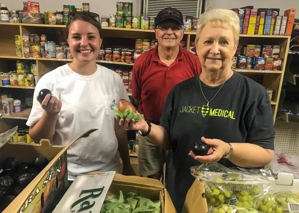 JCOC volunteers in the food pantry